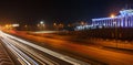 ALMATY, KAZAKHSTAN - February 24, 2016: Evening view of the Almaty city. Park of first president. Light trails on motorway highway Royalty Free Stock Photo