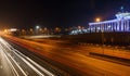 ALMATY, KAZAKHSTAN - February 24, 2016: Evening view of the Almaty city. Park of first president. Light trails on motorway highway Royalty Free Stock Photo