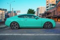 Almaty, Kazakhstan - May 4, 2023: A Bentley Continental GT is parked with a flat rear tire