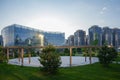 Almaty, Kazakhstan - May 4, 2023: Playground in the city park with fir trees and lawn Royalty Free Stock Photo