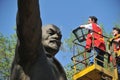 Almaty / Kazakhstan - 04.21.2012 : The people in the cloaks of the Communist party of my statue of Lenin