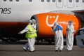 Almaty / Kazakhstan - 03.27.2020 : the security service and medics are preparing to meet passengers during the quarantine