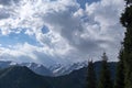 Almaty mountains with cloudy stormy clouds. Overcast - weather storm. Royalty Free Stock Photo