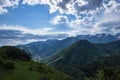 Almaty mountains with cloudy stormy clouds. Overcast - weather storm. Royalty Free Stock Photo