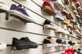 A shoe stand in a sports shoe store. Various collections of sports shop. Bottom side view. Selective soft focus