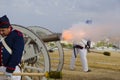 Old cannon firing, artillery soldiers