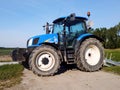 Blue New Holland tractor.