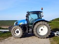 Blue New Holland tractor.