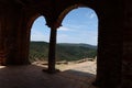 Views of the Sierra de Aracena from the arches of the west portico of the X century mosque of Almonaster la Real. Huelva, Spain