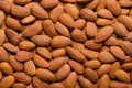 Shelled almonds, whole dried nuts and seeds, background from above Royalty Free Stock Photo