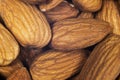 Almond background close up. Macro shot fresh almonds nuts background. Almond texture closeup. Almond heap texture background. Top