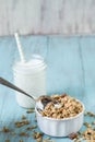 Almond Breakfast Cereal Granola With Glass of Milk And Spoon Royalty Free Stock Photo