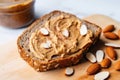 almond butter swirl on a slice of whole grain toast