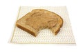 Almond butter wheat toast bitten Royalty Free Stock Photo