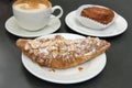 Almond Croissant with Cup of Latte Royalty Free Stock Photo