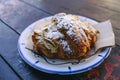 almond croissant on a plate