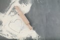 Almond gluten free flour and wooden rolling pin on a gray background with copy space Royalty Free Stock Photo