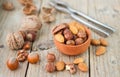 Almond, hazelnut and walnut. Nuts in a clay bowl Royalty Free Stock Photo