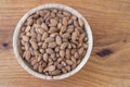 Almond kernel in a bowl. Background view from above. Healthy food.