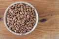 Almond kernel in a bowl. Background view from above. Healthy food.