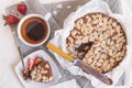 Almond kuchen, strawberries, tea and knife