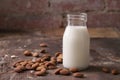 Almond milk in a glass jar with almonds Royalty Free Stock Photo