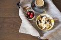 Almond Milk Quinoa With Fresh Fruits, Cherries And Coffee in a Tray. Healthy Breakfast, Lifestyle Concept. Top View. Dark Wooden B Royalty Free Stock Photo