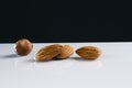 Almond nuts on a black white background