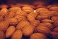 Almond nuts closeup. Soft focus. TxtAlmond nuts closeup. Soft focus. Natural background textured Royalty Free Stock Photo