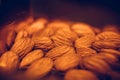 Almond nuts closeup. Soft focus. TxtAlmond nuts closeup. Soft focus. Natural background textured Royalty Free Stock Photo