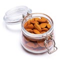 Almond nuts in a glass bowl isolated on a white background Royalty Free Stock Photo