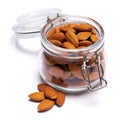 Almond nuts in a glass bowl isolated on a white background Royalty Free Stock Photo