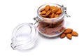 Almond nuts in a glass bowl isolated on a white background Royalty Free Stock Photo