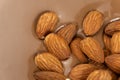 Almond nuts in melted milk chocolate macro Royalty Free Stock Photo