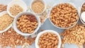 Almond nuts in a white bowl on wood background with nuts around the bowl Ai Generated