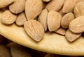 Almond nuts in the wooden bowl