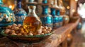 Almond oil in glass bottle with nuts on the table in morocco Royalty Free Stock Photo