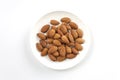 almonds,almond group, almonds in white dish on over white background