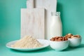 Almonds, almond milk and almond flour. Alternative type of flour containing net carbs, gluten free flour, lactose free milk, keto Royalty Free Stock Photo