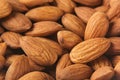 Almonds background. Pile of selected almonds close-up. Royalty Free Stock Photo