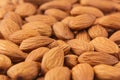 Almonds background. Pile of selected almonds close-up. Royalty Free Stock Photo