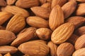 Almonds background. Pile of selected almonds close-up. Royalty Free Stock Photo