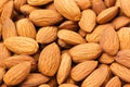 Almonds background. Pile of selected almonds close-up. Royalty Free Stock Photo