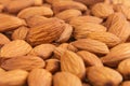 Almonds background. Pile of selected almonds close-up. Royalty Free Stock Photo