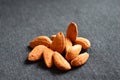 Almonds on a black table Royalty Free Stock Photo