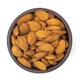 Almonds in brown bowl isolated on white background Royalty Free Stock Photo