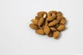 Almonds composition in a white background Royalty Free Stock Photo