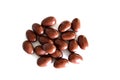 Almonds covered with milk chocolate, white background Royalty Free Stock Photo