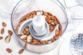 Almonds in a food processor ready to be crushed Royalty Free Stock Photo