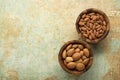 Almonds nuts in wooden bowl